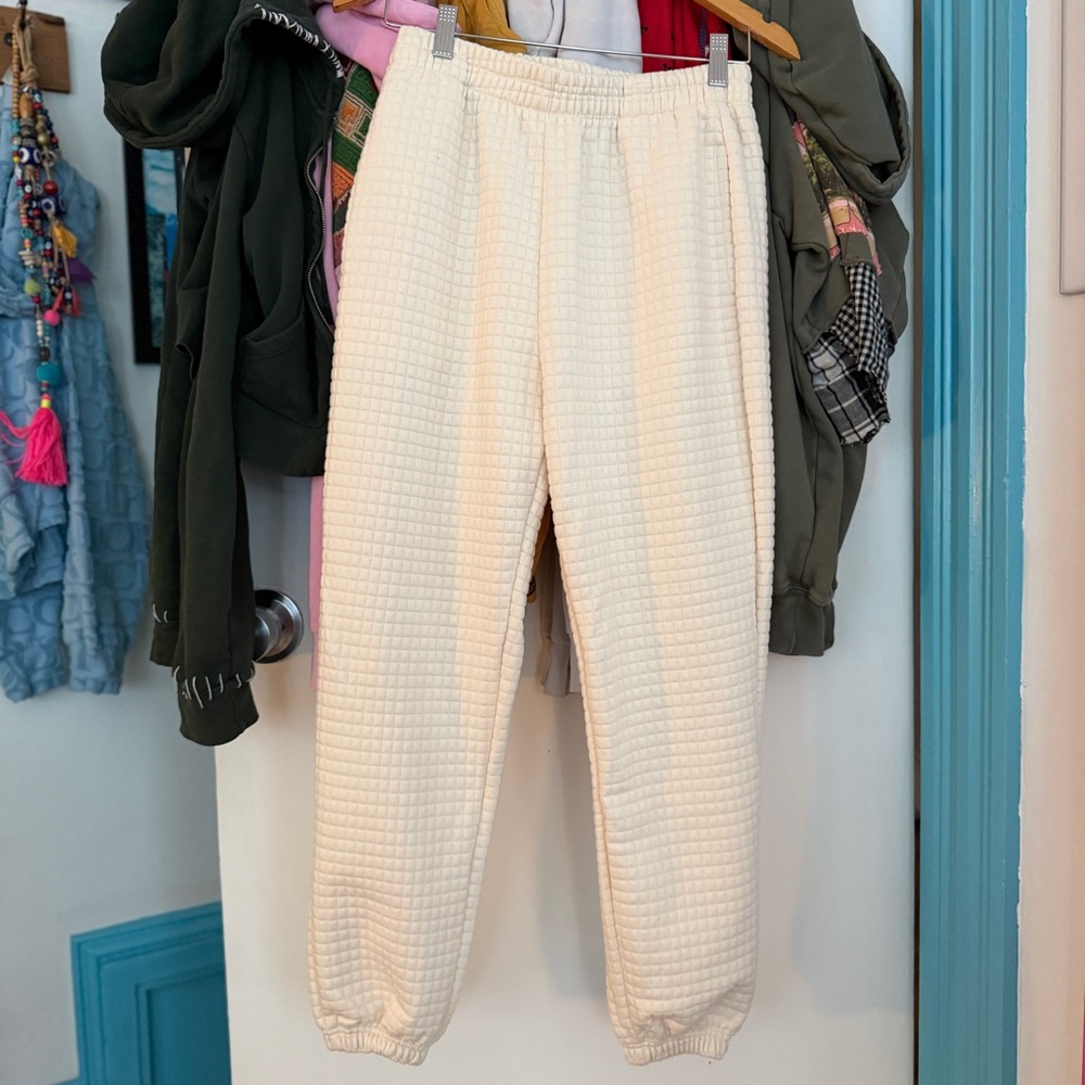 cream quilted trousers with elasticated waist and ankles